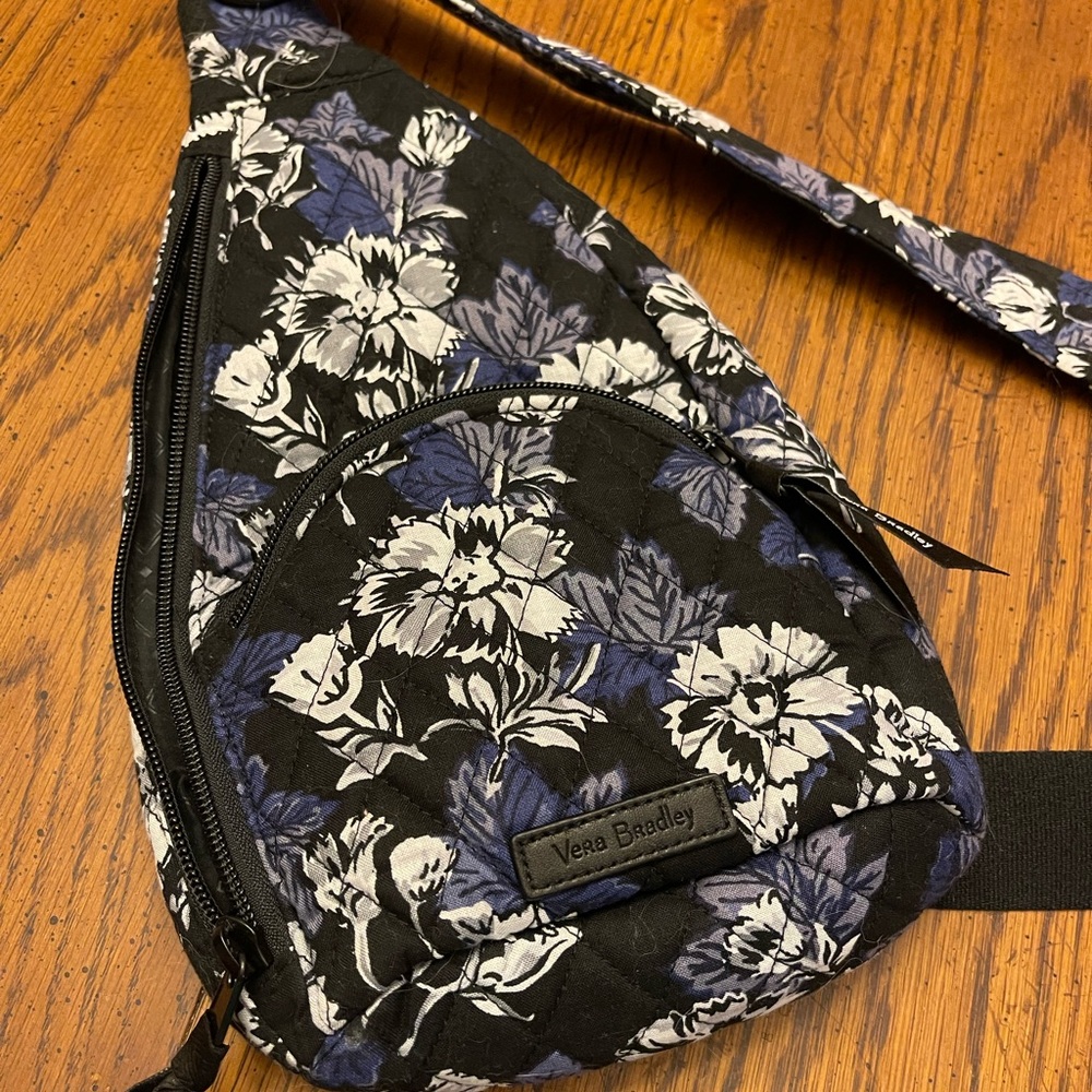 Vera Bradley sling backpack.